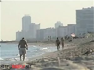 peeping at a super hot nudist couple on the beach